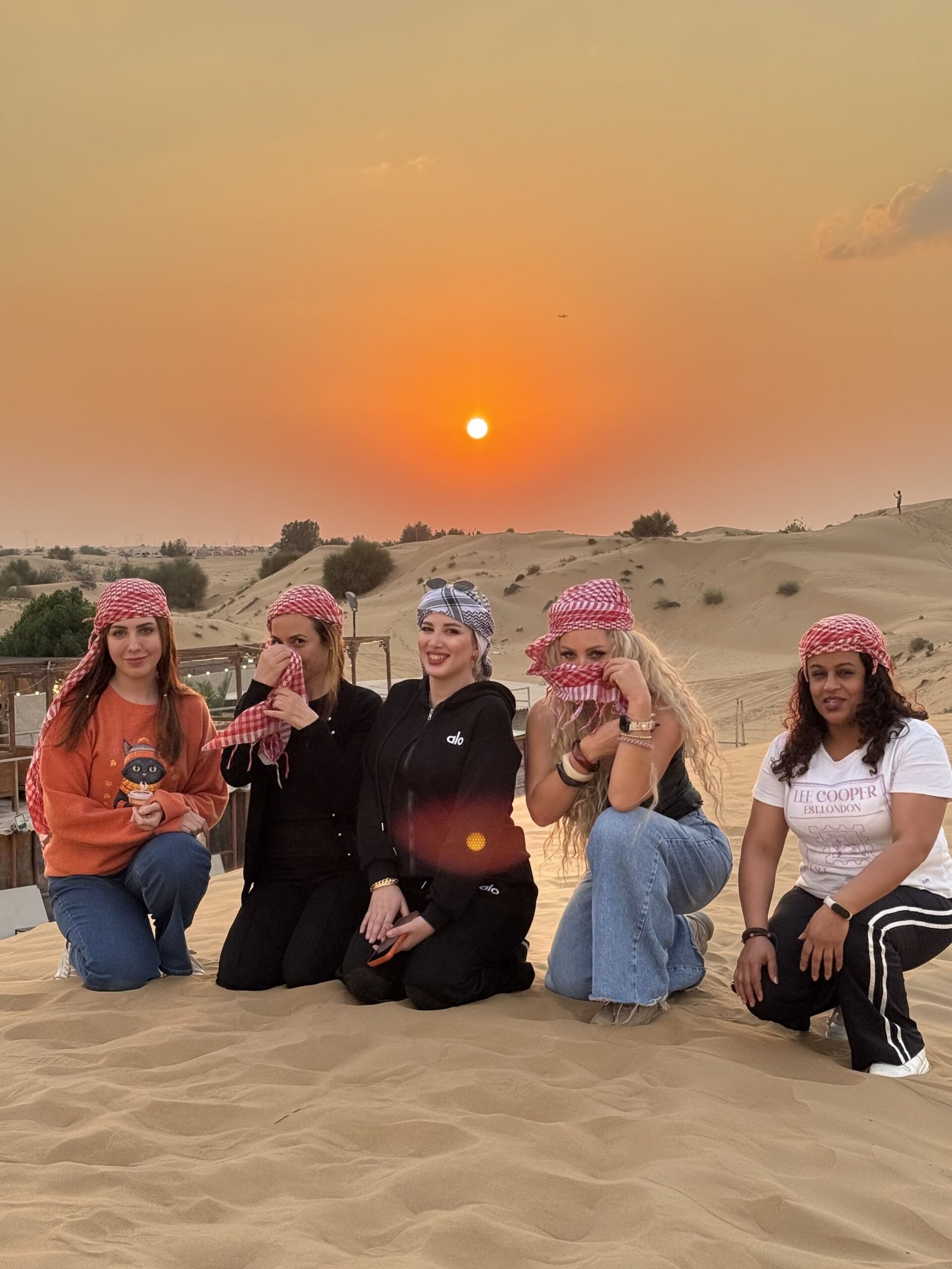 Camel ride during evening desert safari at Lahbab