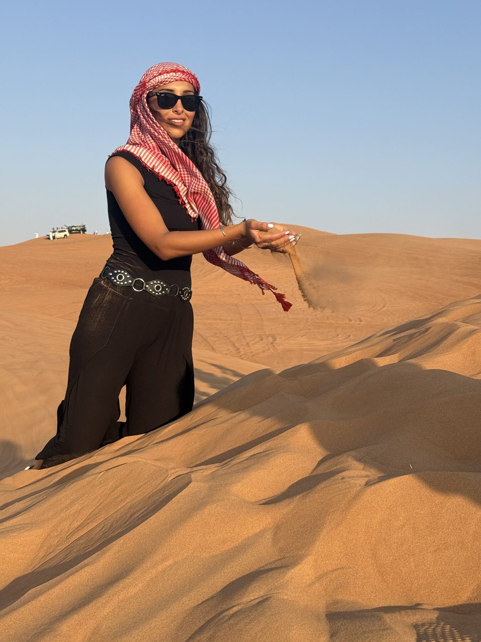 Red sand dunes of Lahbab Desert during golden morning light