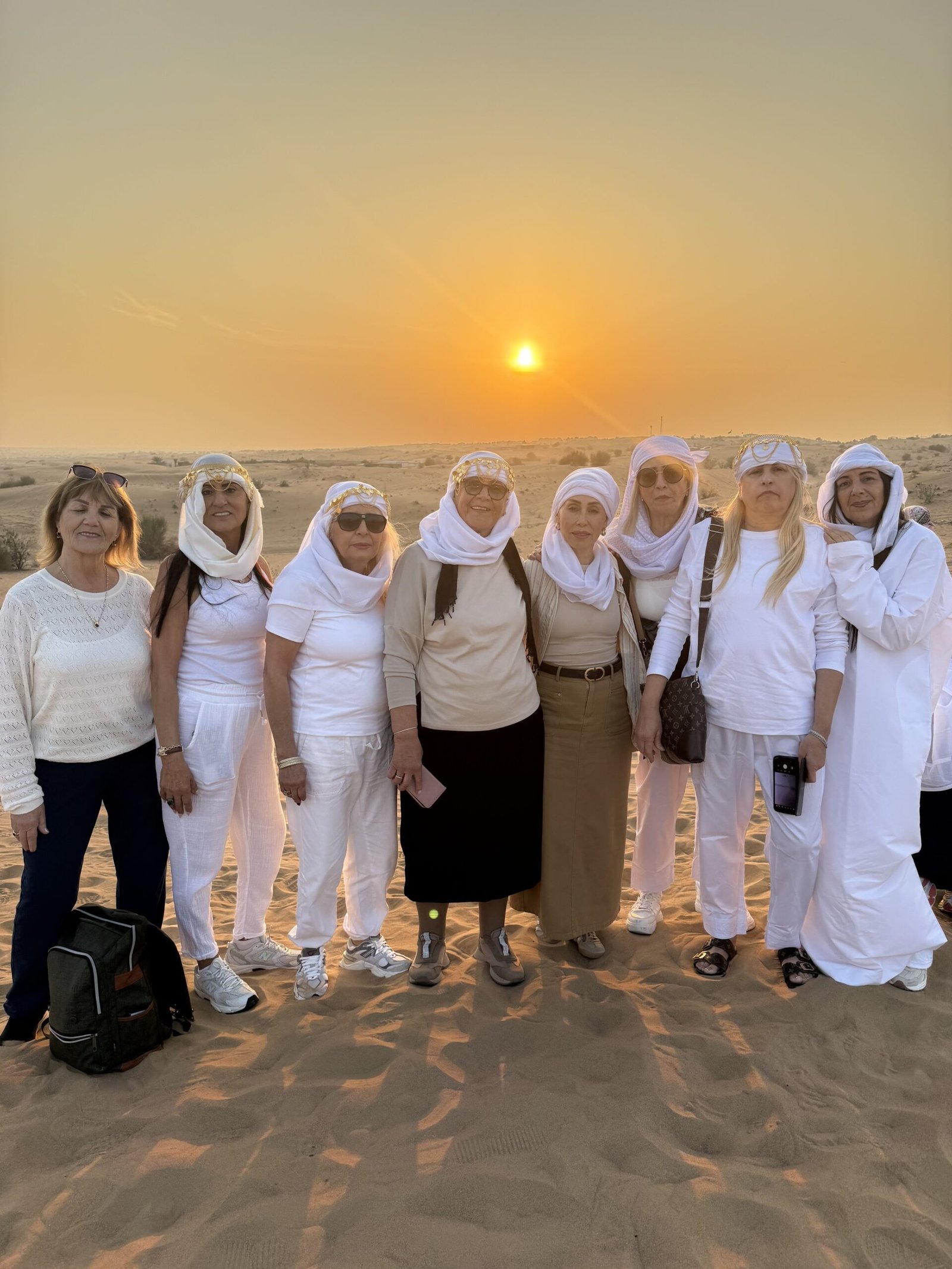 Evening desert safari sunset over Lahbab Red Dunes, Dubai